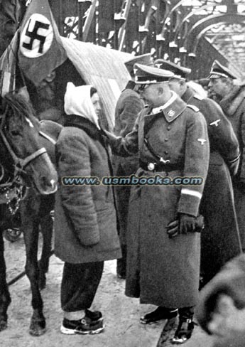 Heinrich Himmler greeting ehtnic Germans upon their return to Greater Germany